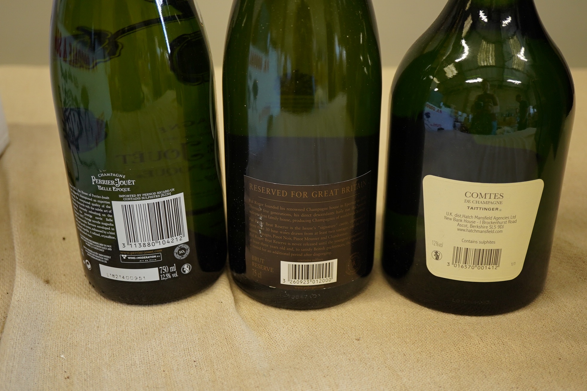 A bottle of 2007 Perrier - Jouet Belle Epoque Champagne, a bottle of Taittinger Comtes Champagne and a bottle of Pol Roger Extra Cuvee Reserve Champagne (3)